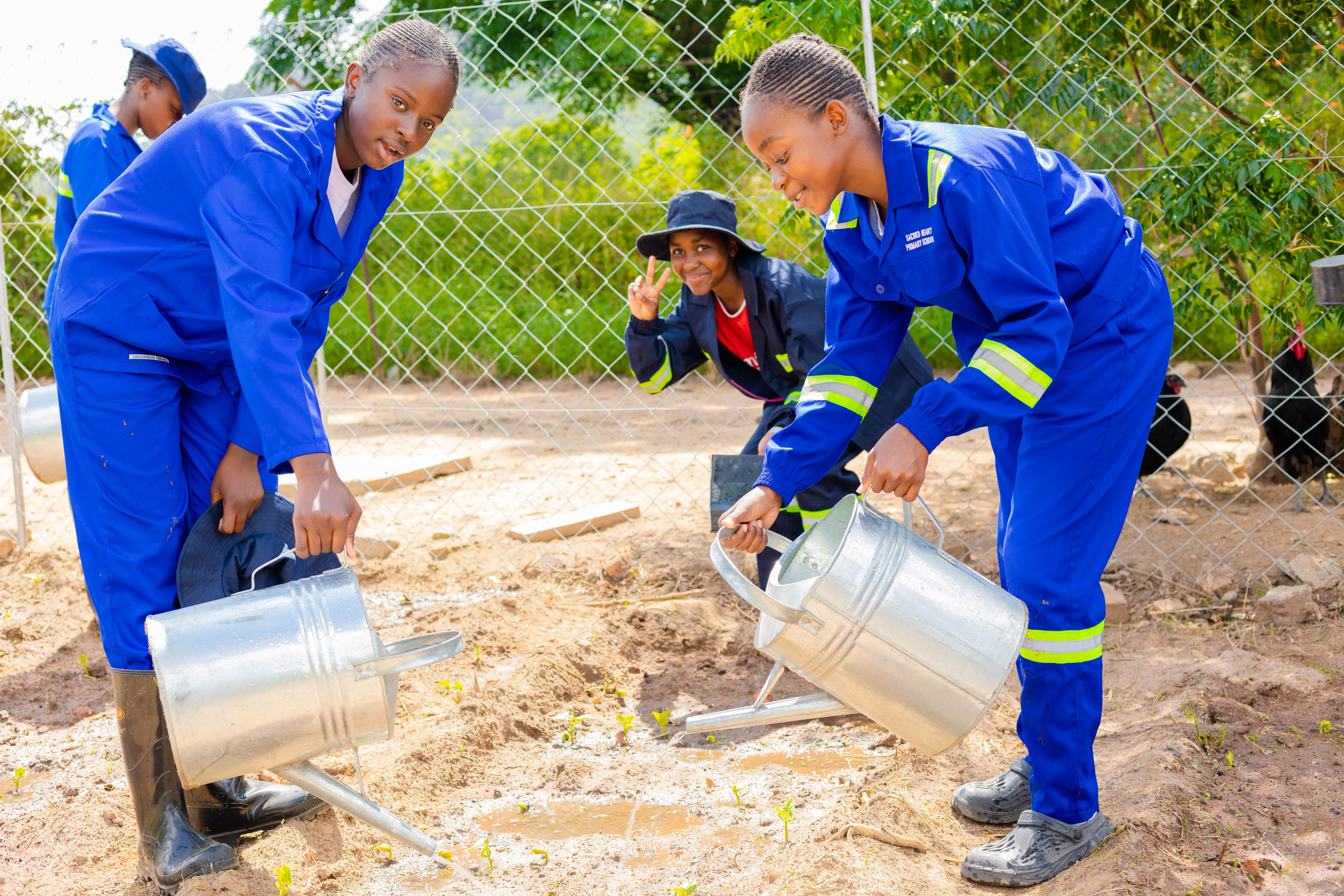 Agriculture learners collaborating during practicals